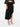 Jupe midi asymétrique en laine noire par Alaïa